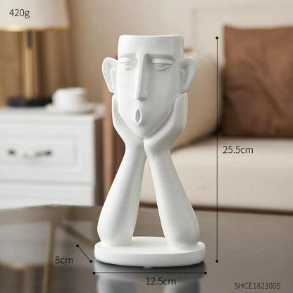 Trio de sculptures de pots de fleurs visages émotionnels