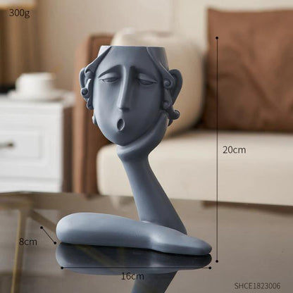 Trio de sculptures de pots de fleurs visages émotionnels