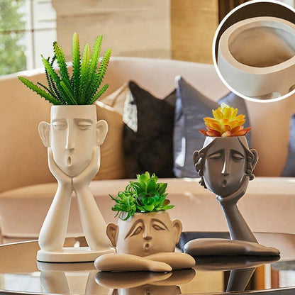 Trio de sculptures de pots de fleurs visages émotionnels