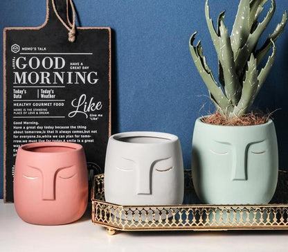 Jardinière abstraite en céramique pour visage endormi